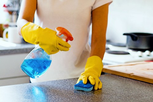 Technician preparing carpet cleaning equipment safely
